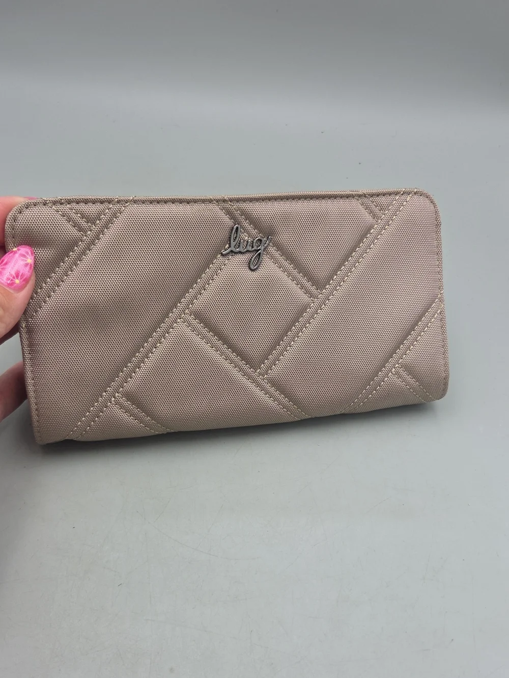 Lug Arabesque Ultra X Zip RFID Wallet in a sand Beige color